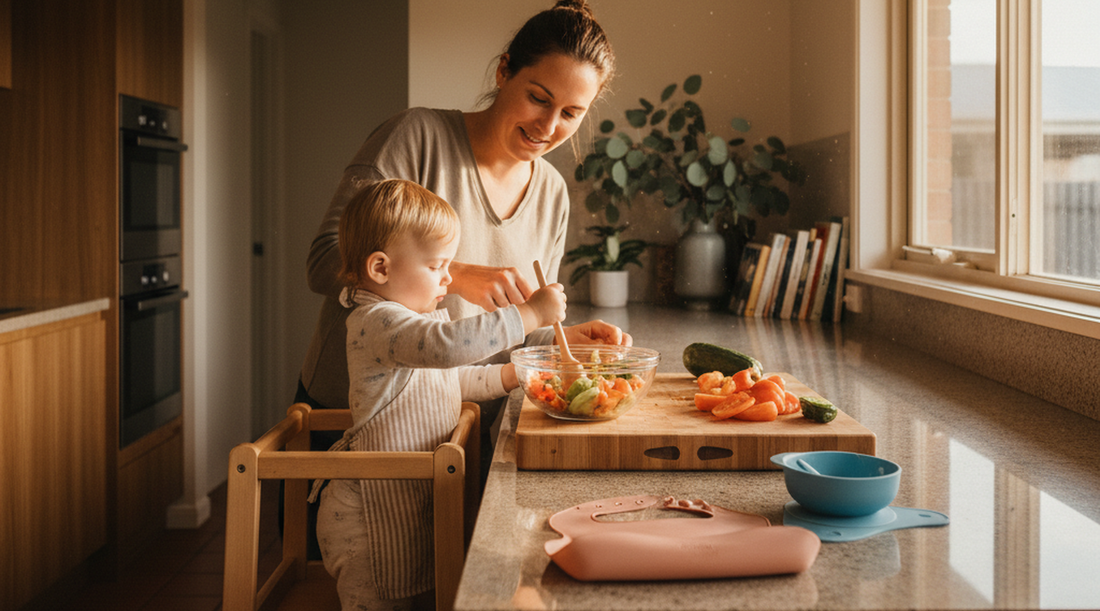 Parent and toddler preparing dinner together in warm kitchen