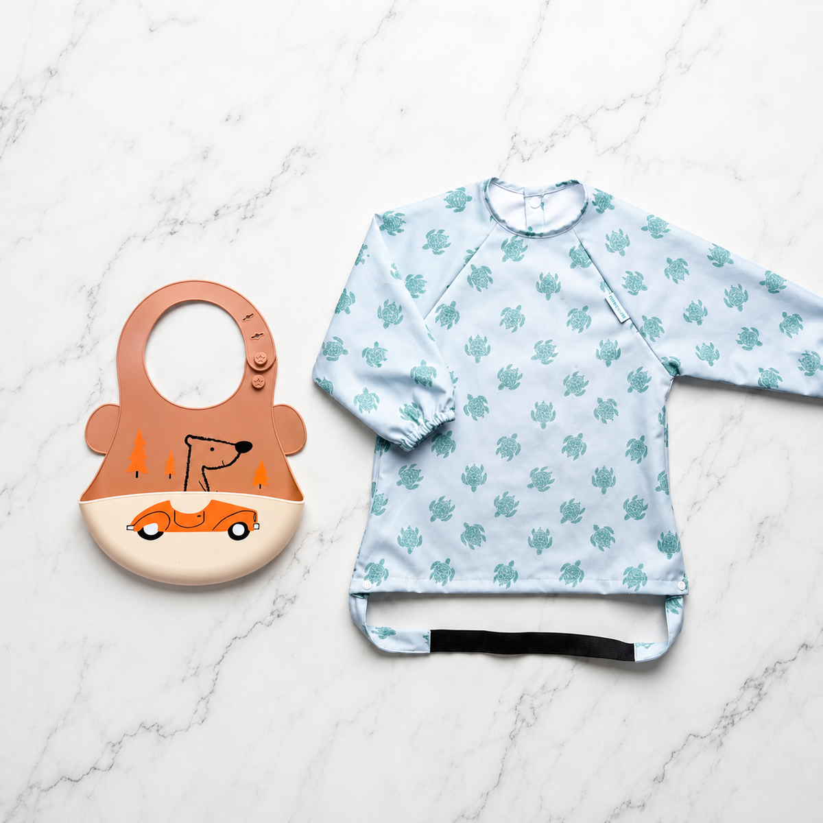 Silicone Bib vs Coverall Bib: Which One Does Your Toddler Actually Need?