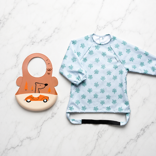 Silicone Bib vs Coverall Bib: Which One Does Your Toddler Actually Need?